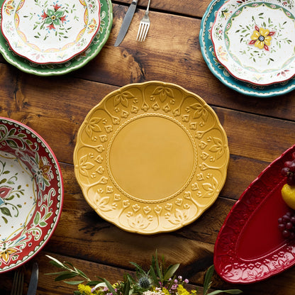 Decorative plates with floral patterns on a wooden table