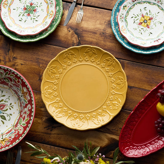 Decorative plates with floral patterns on a wooden table