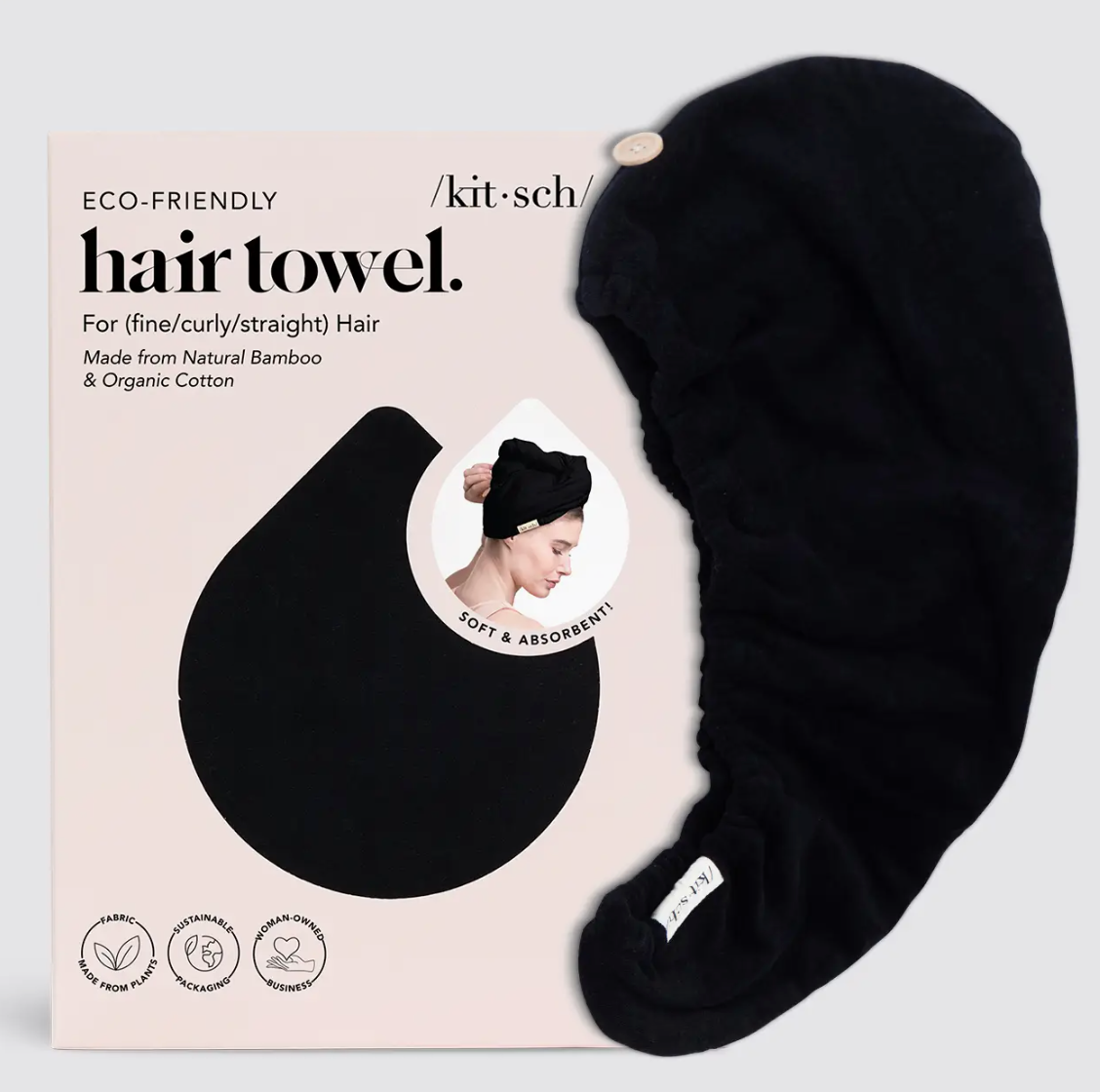 Black hair towel with packaging on a light gray background by KITSCH