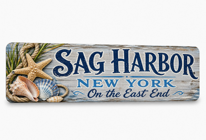 Sag Harbor New York metal sign with printed weathered vintage design featuring sailboats and coastal village scenery.