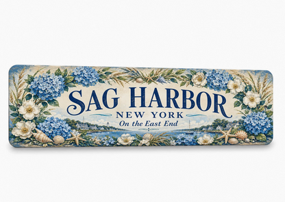 Sag Harbor New York metal sign framed with blue hydrangeas, white flowers, seashells and coastal accents.