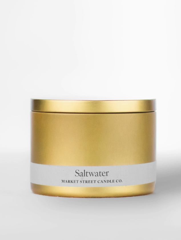 Saltwater 8 oz Travel Tin soy candle in a sleek gold metal tin with white Market Street Candle Co. label.