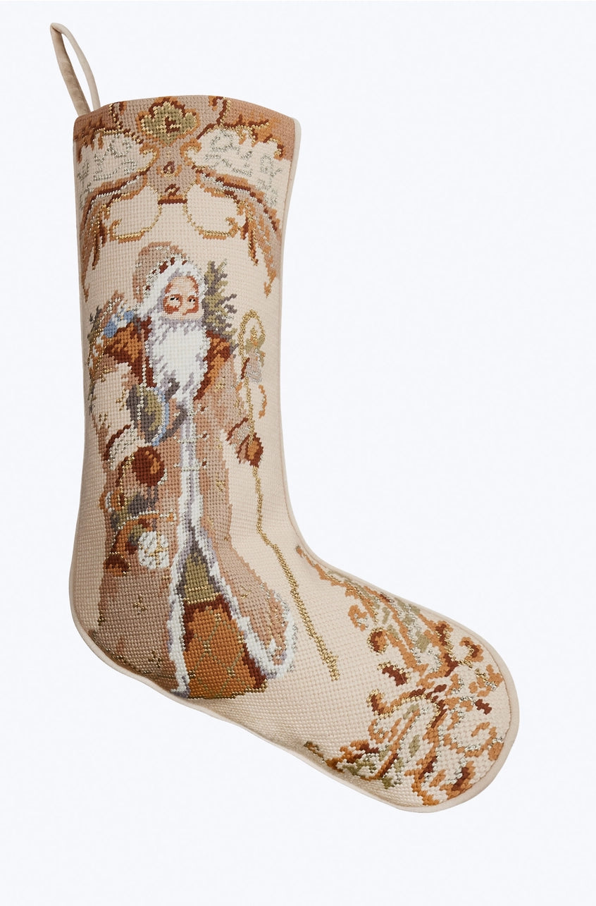 Decorative Christmas stocking with embroidered design on a white background