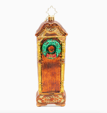 Back of Christopher Radko Sleighbells Past Midnight glass ornament with wood-look finish and Christmas wreath