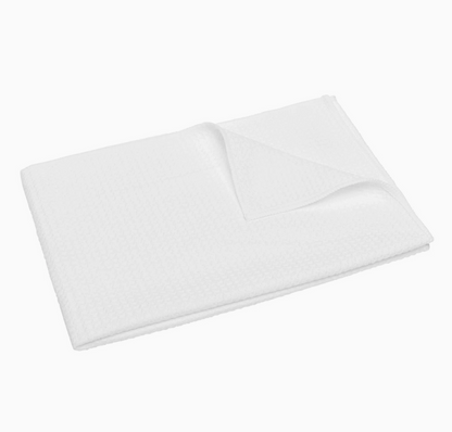 White waffle weave kitchen towel showing absorbent textured fabric