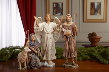 Angel and shepherd figures from Three Kings 16-piece Christmas Nativity