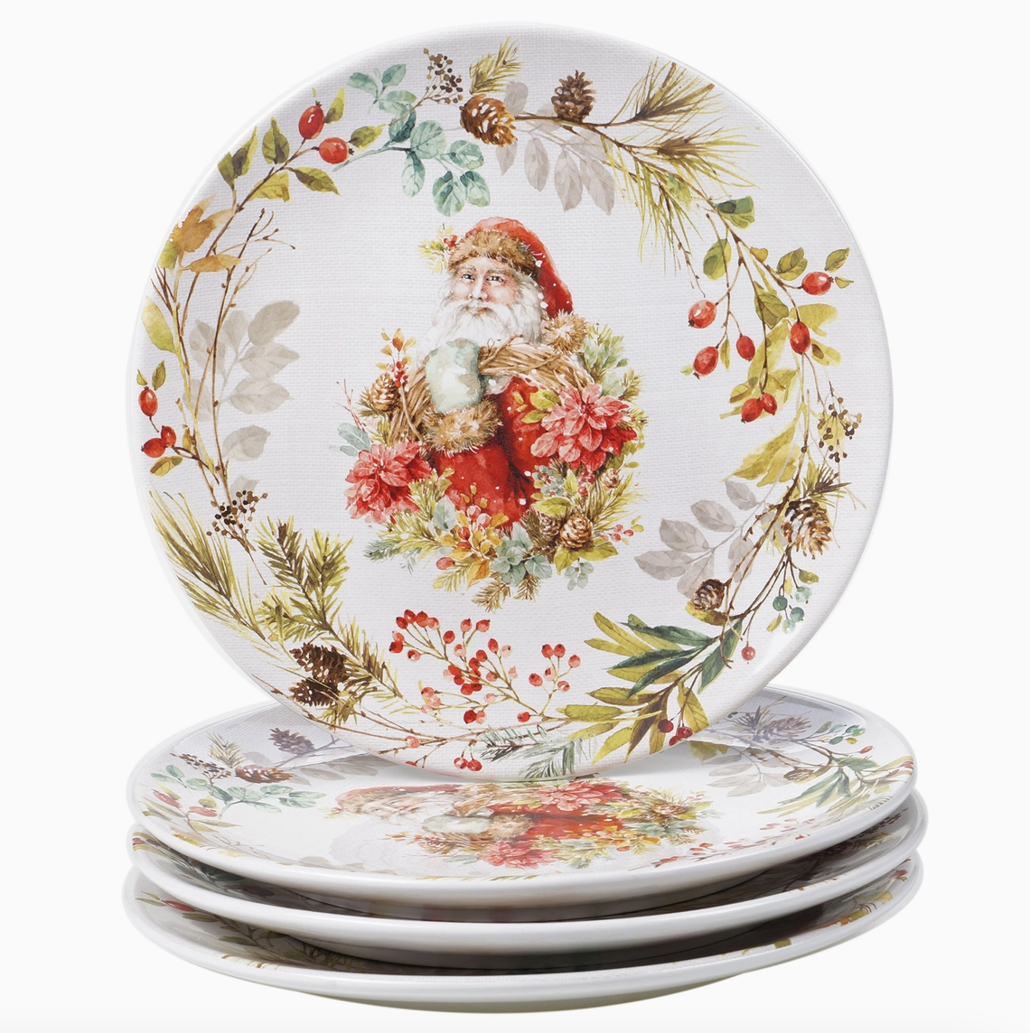 A Christmas Story vintage Santa dinner plates by Certified International displayed beside a fireplace with pinecones and Christmas greenery