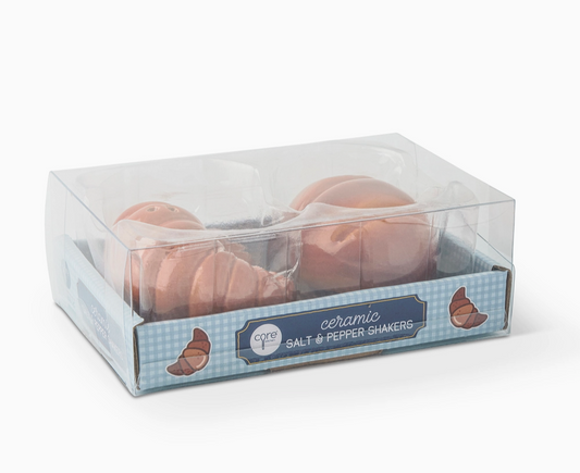 Croissant ceramic salt and pepper shaker set displayed together in clear gift packaging