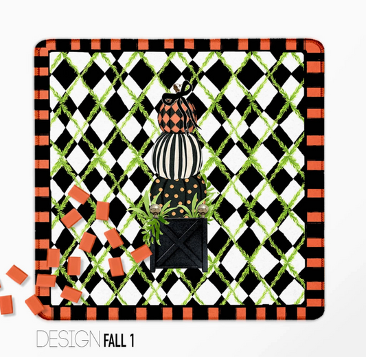 Halloween Mahjong mat with stacked patterned pumpkins and black-and-white diamond design