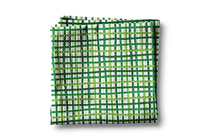Green and white checkered fabric on a white background