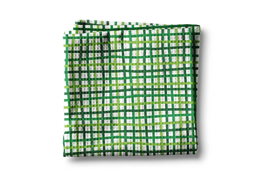 Green and white checkered fabric on a white background