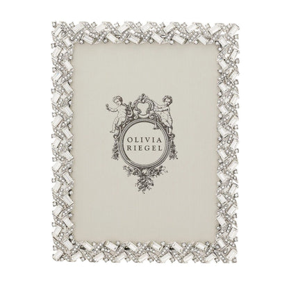 Decorative photo frame with crystal embellishments on a white background