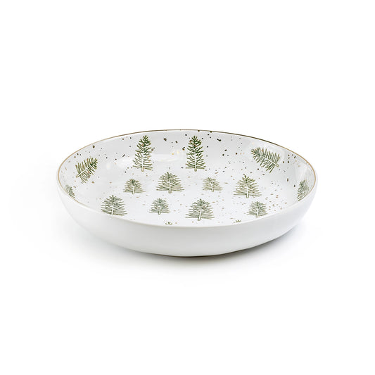 White ceramic bowl with green tree pattern on a white background