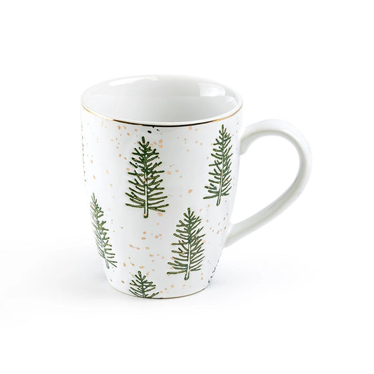 White mug with green tree patterns on a white background