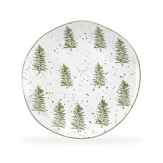 Round ceramic plate with green leaf pattern on a white background