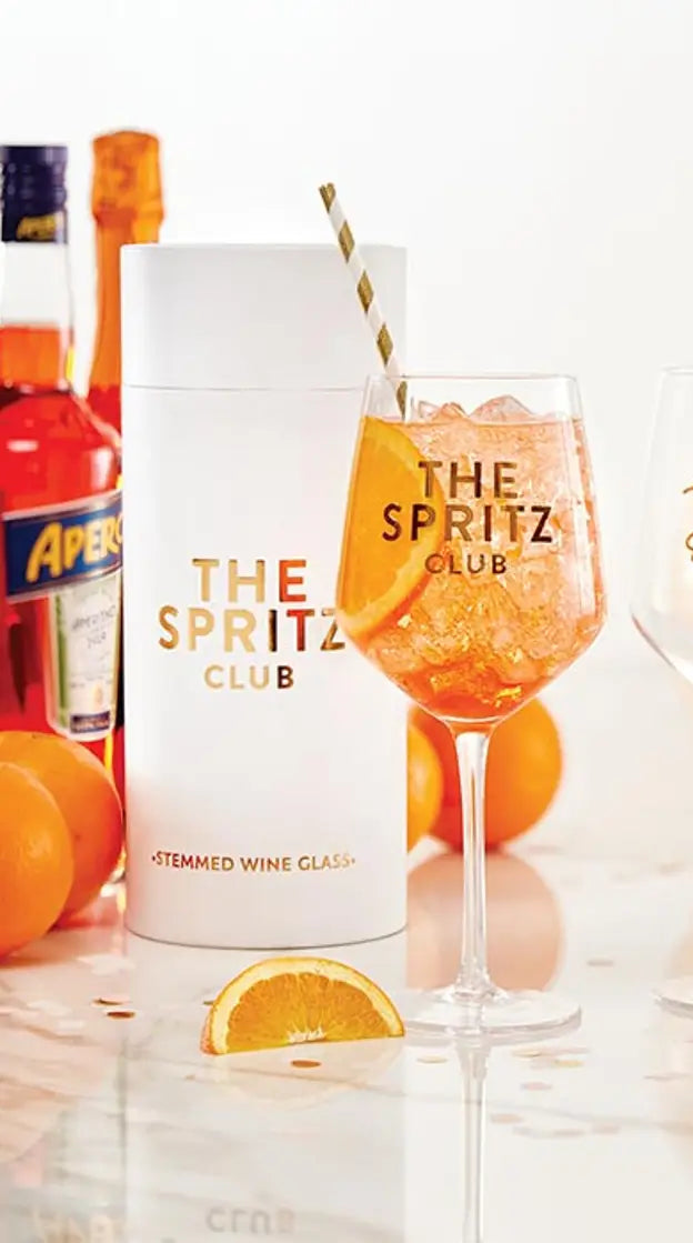 Wine glasses and containers with 'The Spritz Club' branding on a white background.