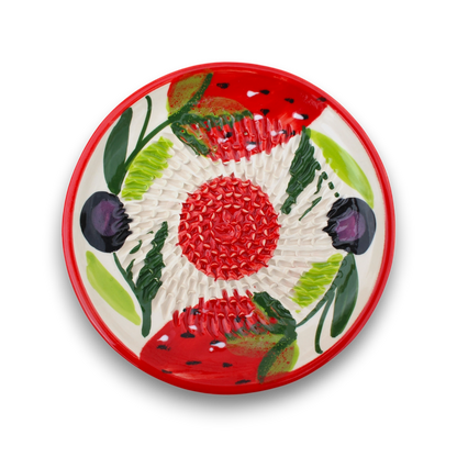 Decorative plate with floral design on a white background