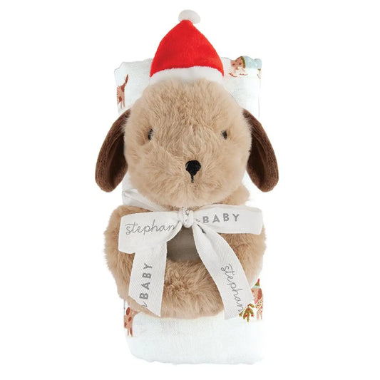 Plush dog toy with a Santa hat and baby blanket on a white background