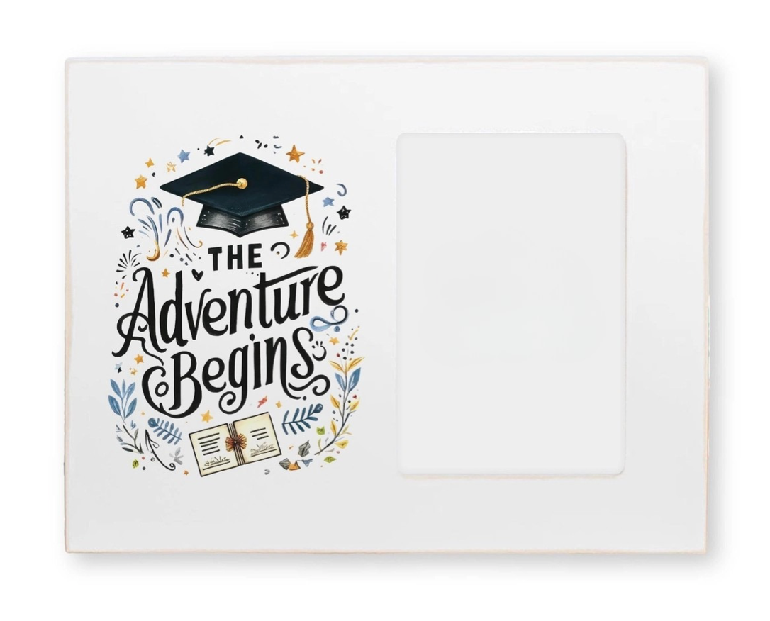 Graduation-themed card with 'The Adventure Begins' text and a cap on a white background