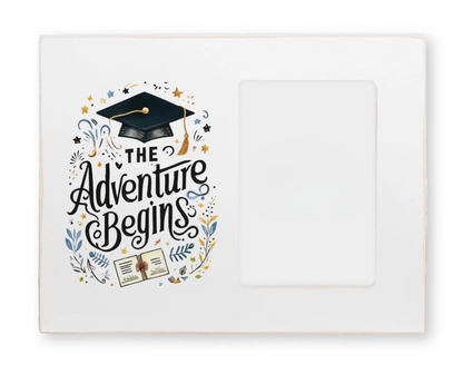 Graduation-themed card with 'The Adventure Begins' text and a cap on a white background