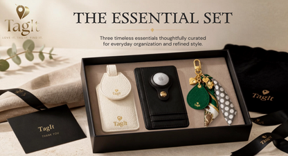The Essentials Set featuring black leather AirTag wallet, ivory luggage tag and emerald green panther bag charm in gift presentation box