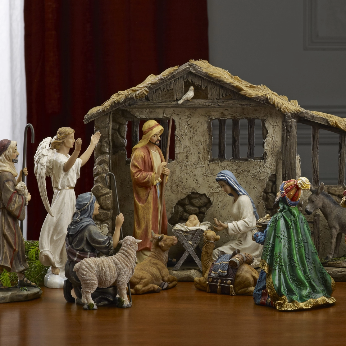 Complete 16-piece Christmas Nativity scene with lighted stable, Holy Family, Three Kings and animals