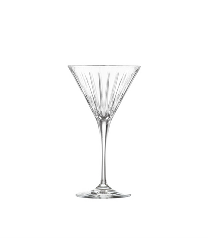 Clear martini glass on a white background