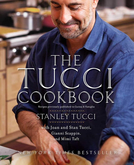 Book cover of 'The Tucci Cookbook' featuring a man in a kitchen.