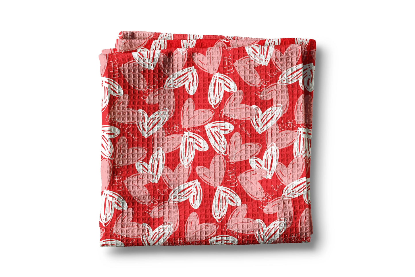 Red fabric with white heart pattern on a white background