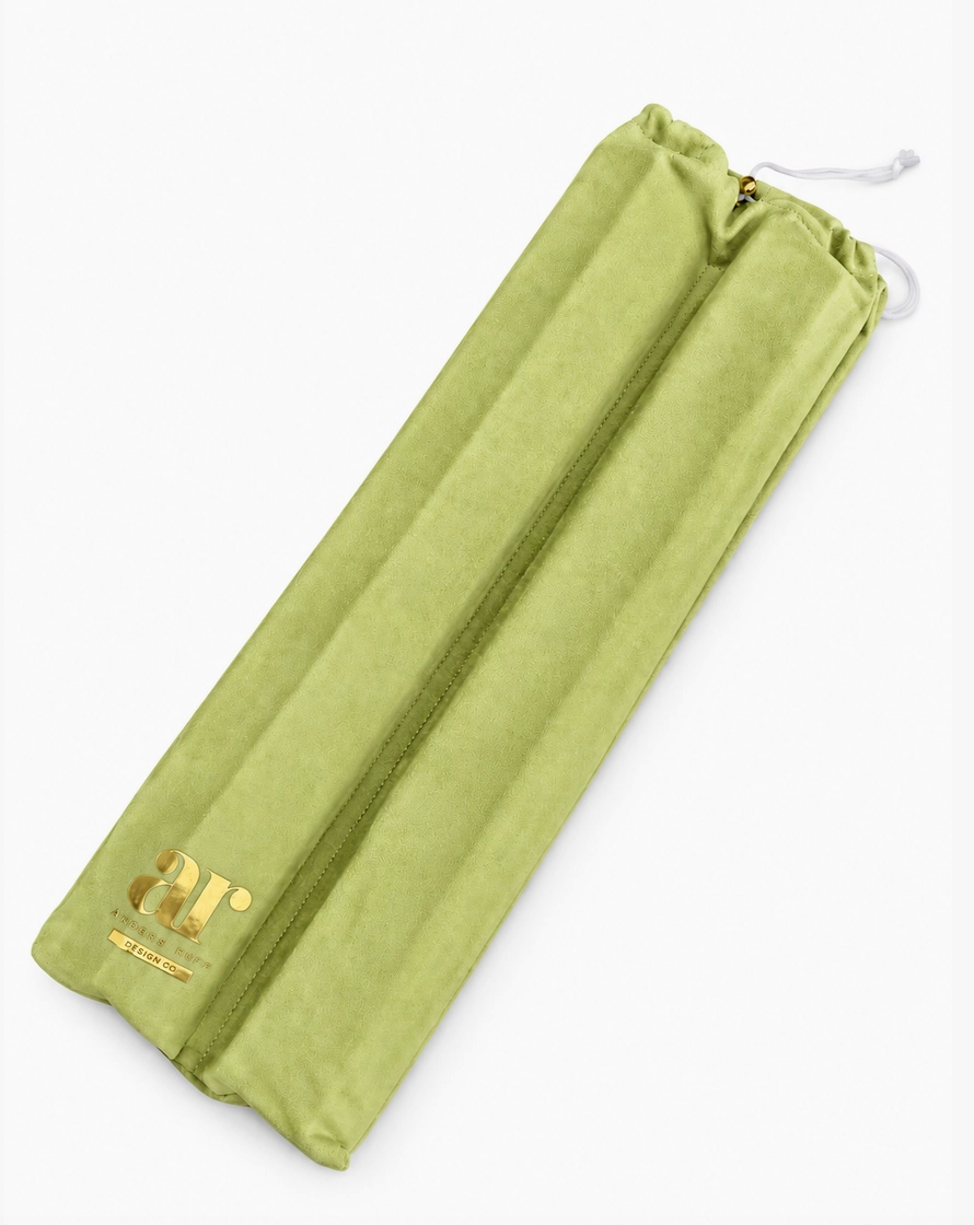 Pistachio green velvet Mahjong rack storage cover with divided compartments, drawstring closure, and gold logo detailing.