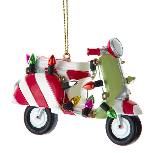 Decorative motorcycle ornament with lights on a white background