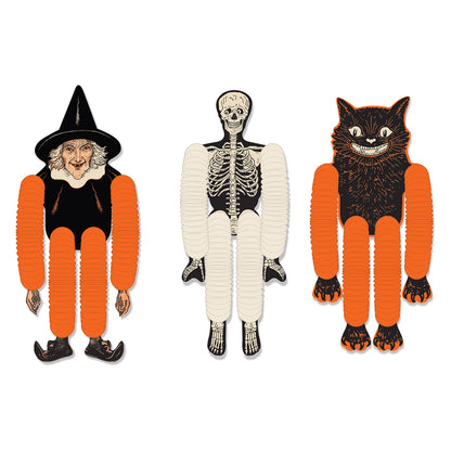 Three Halloween-themed figures: a witch, skeleton, and black cat on a white background