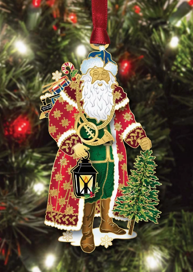 Decorative Christmas ornament of a traditional Santa Claus figure on a tree.