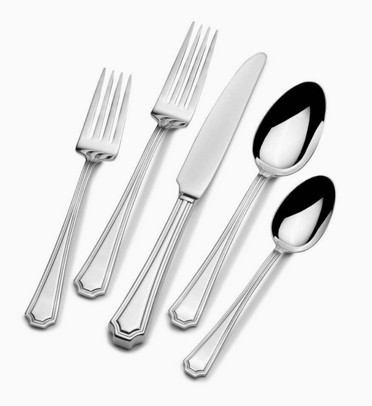 Wallace Audra 20-piece flatware set featuring sleek handles with linear detailing and distinctive stepped ends, service for four.