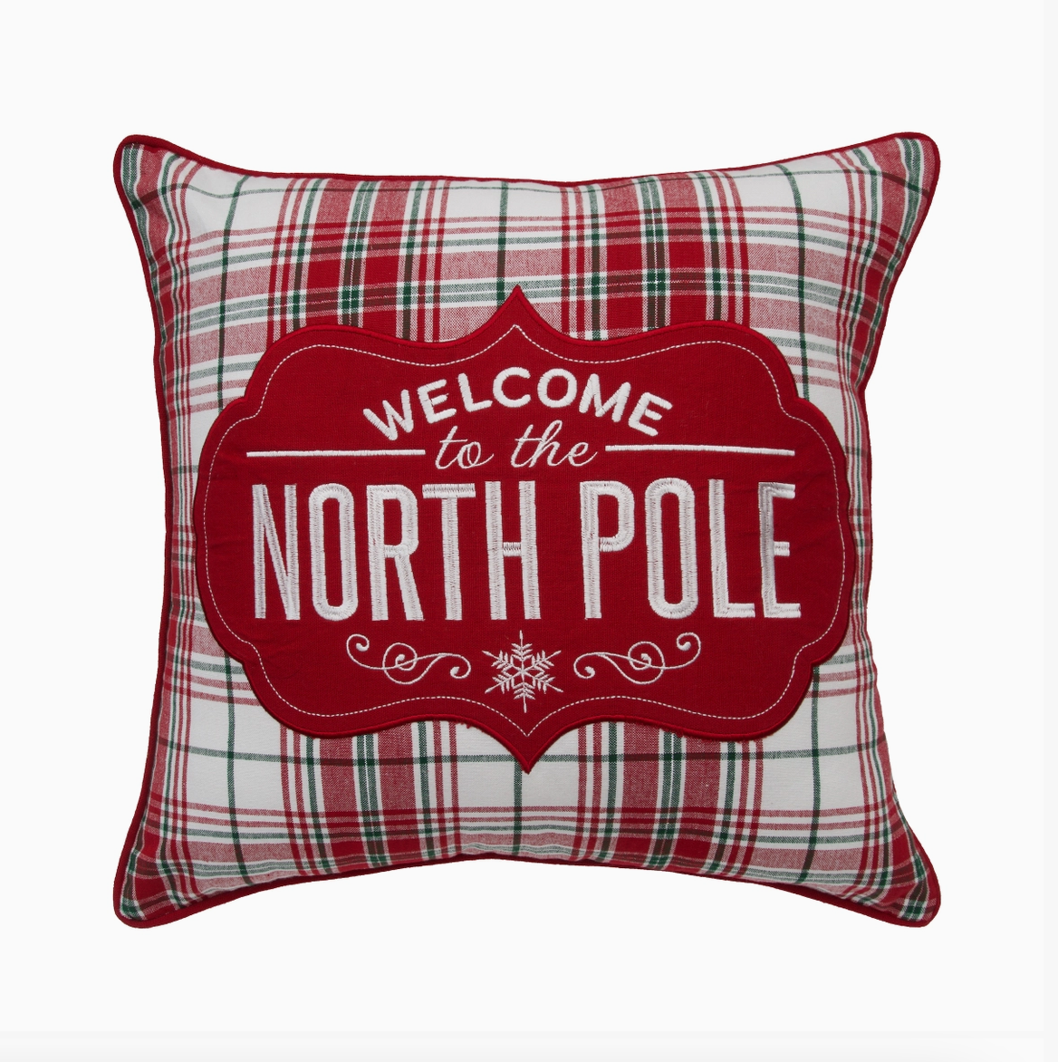 18-inch Christmas throw pillow with red, green, and white plaid fabric, red appliqué, embroidered Welcome to the North Pole lettering, and snowflake accents.