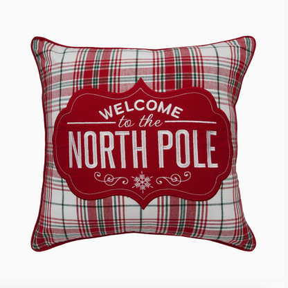 18-inch Christmas throw pillow with red, green, and white plaid fabric, red appliqué, embroidered Welcome to the North Pole lettering, and snowflake accents.