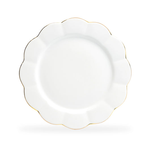 White plate with gold rim on a white background