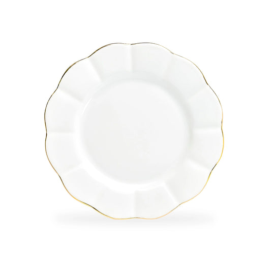 White plate with gold rim on a white background