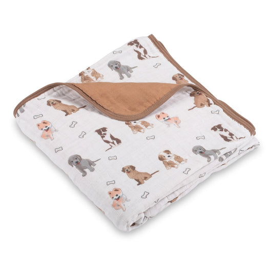 Folded blanket with dog pattern on a white background