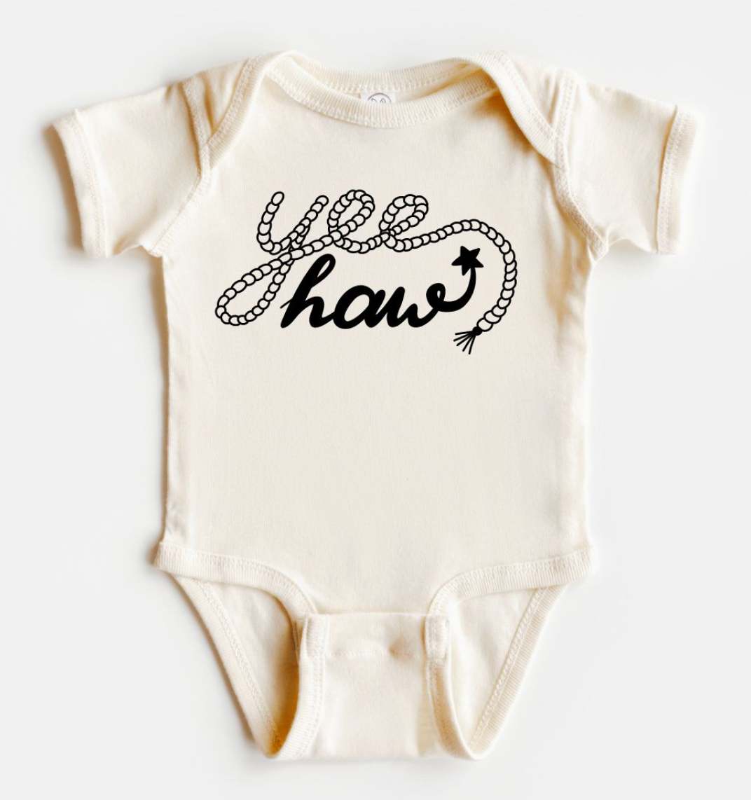 Baby onesie with 'Yee haw' design on a white background