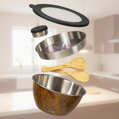 Set of stainless steel and wooden kitchen utensils on a green background
