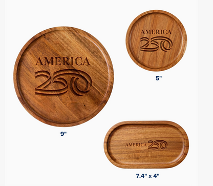 Three wooden trays with 'America 250' engraving on a white background