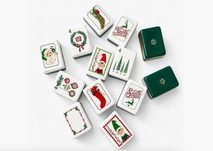 Close-up of Dear Santa Christmas Mahjong tiles featuring Santa, vintage elves, stockings, bottle brush trees, wreaths and reindeer.