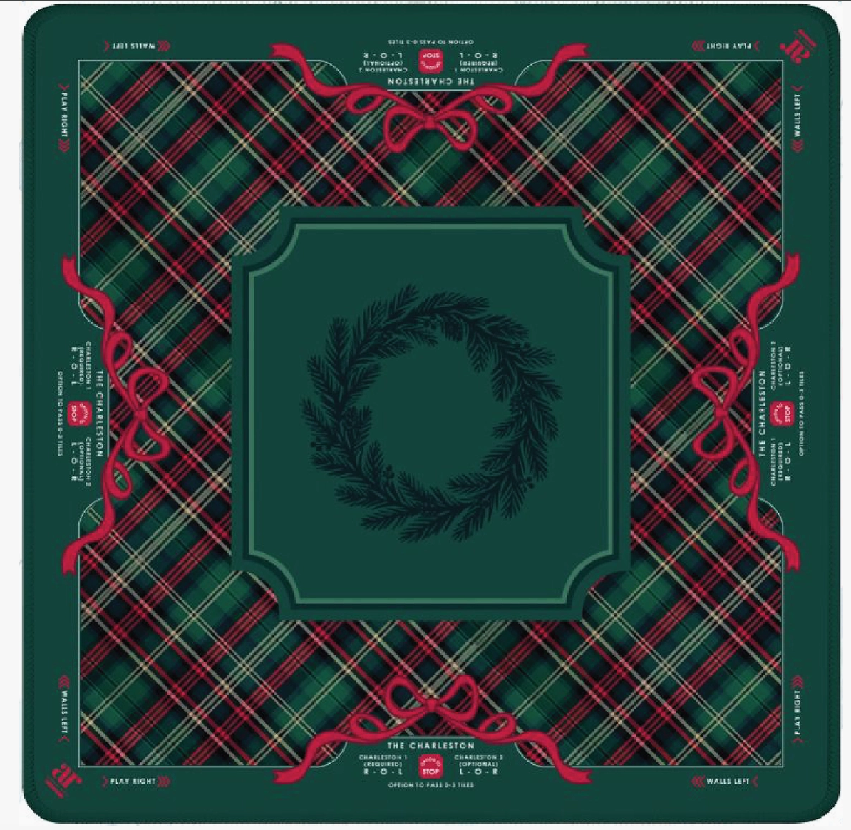 Evergreen & Tartan Christmas Mahjong mat by Anders Ruff featuring green tartan plaid, red ribbon bows and tonal evergreen wreath centerpiece.