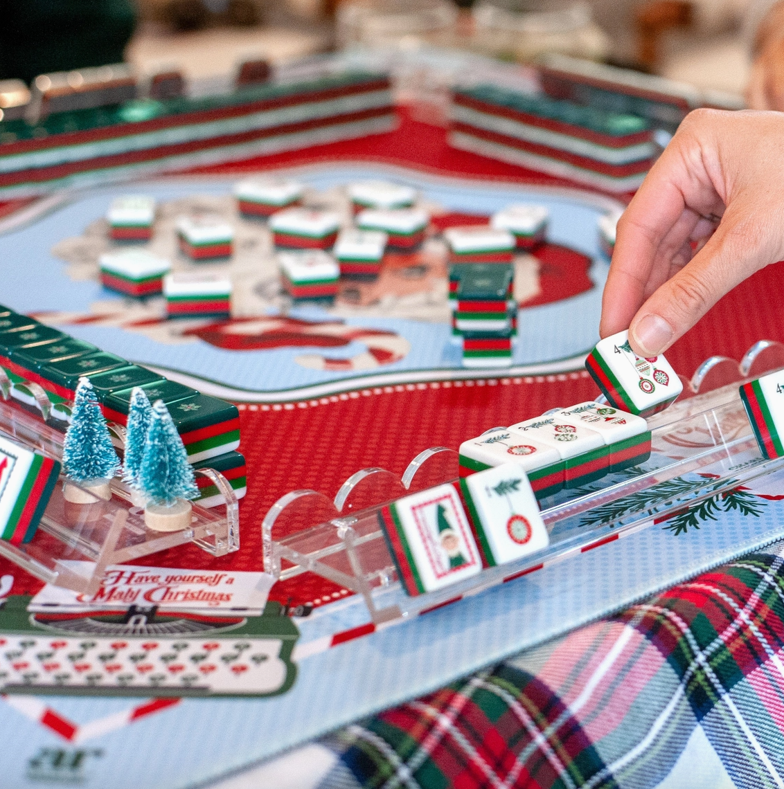 Santa's Mahjong Mail Christmas Mahjong mat with coordinating holiday Mahjong tiles during festive game play.